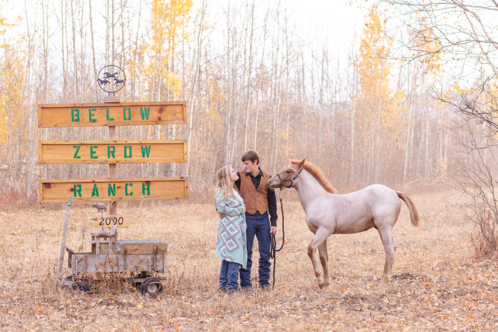 couple on the farm for an engagment photo